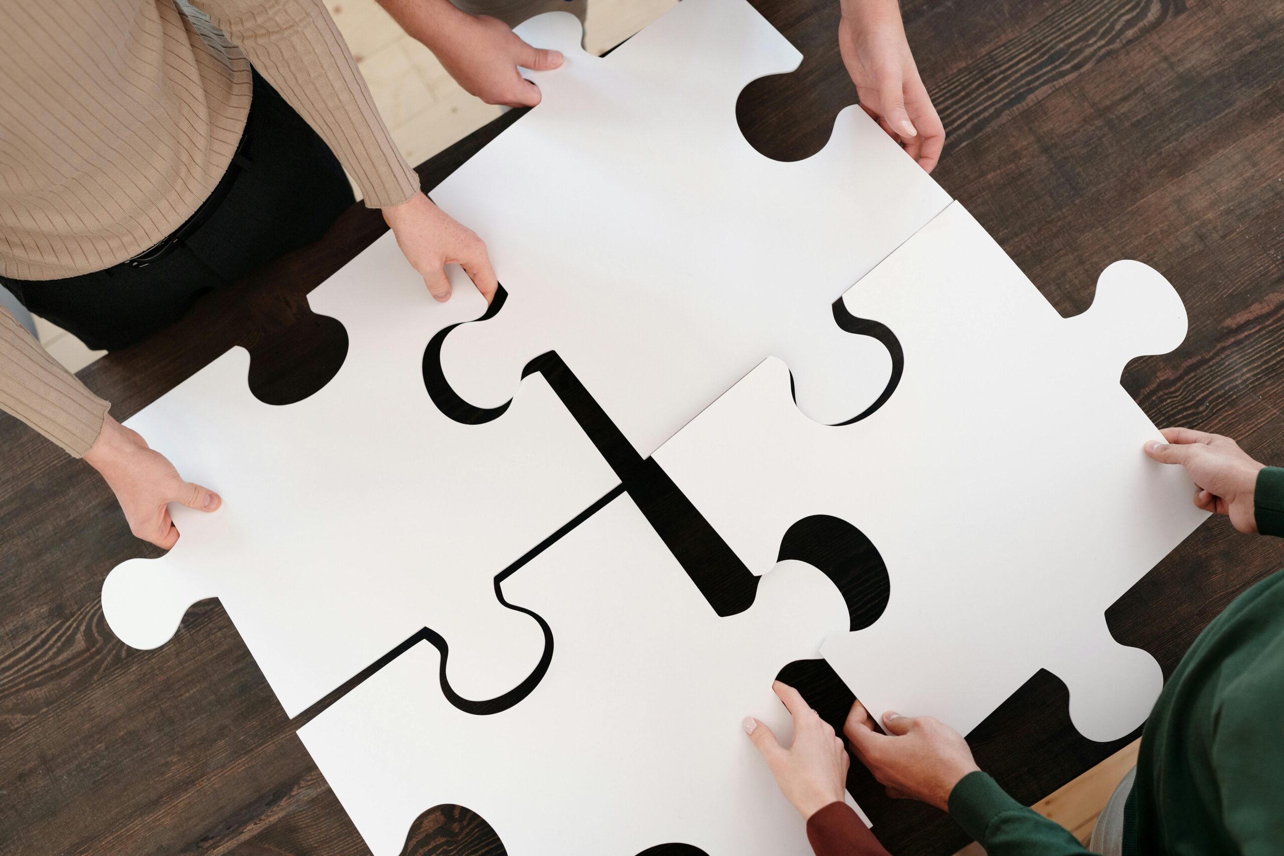 Équipe puzzle collaboration stratégie business Paris MAC Consulting pièces imbriquer solution