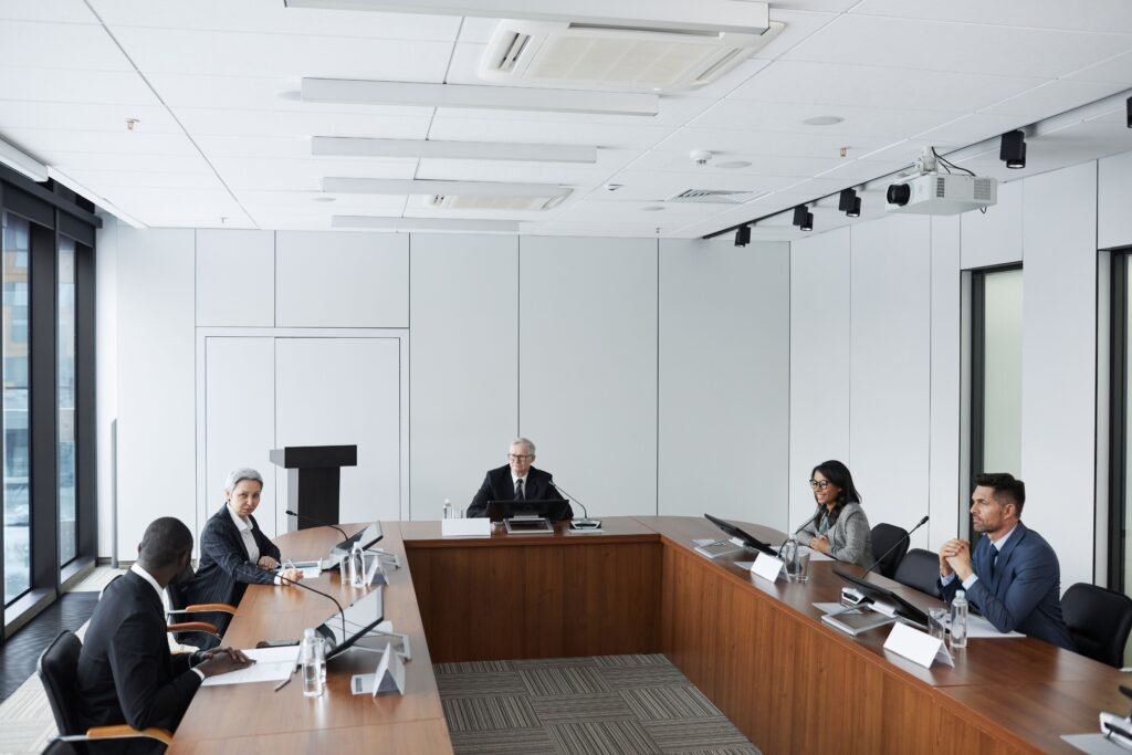 Réunion de direction commerciale externalisée MAC Consulting Paris en salle de conférence